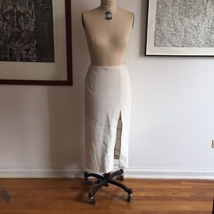 Bright white midi skirt with sexy high front slit